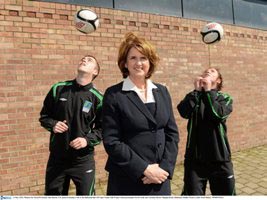 Minister for Social Protection, Joan Burton T.D. pictured during a visit to the Project FUTSAL Ballymun training hub with project FUTSAL participants Kevin Kelly and Christina Byrne. Picture credit: P