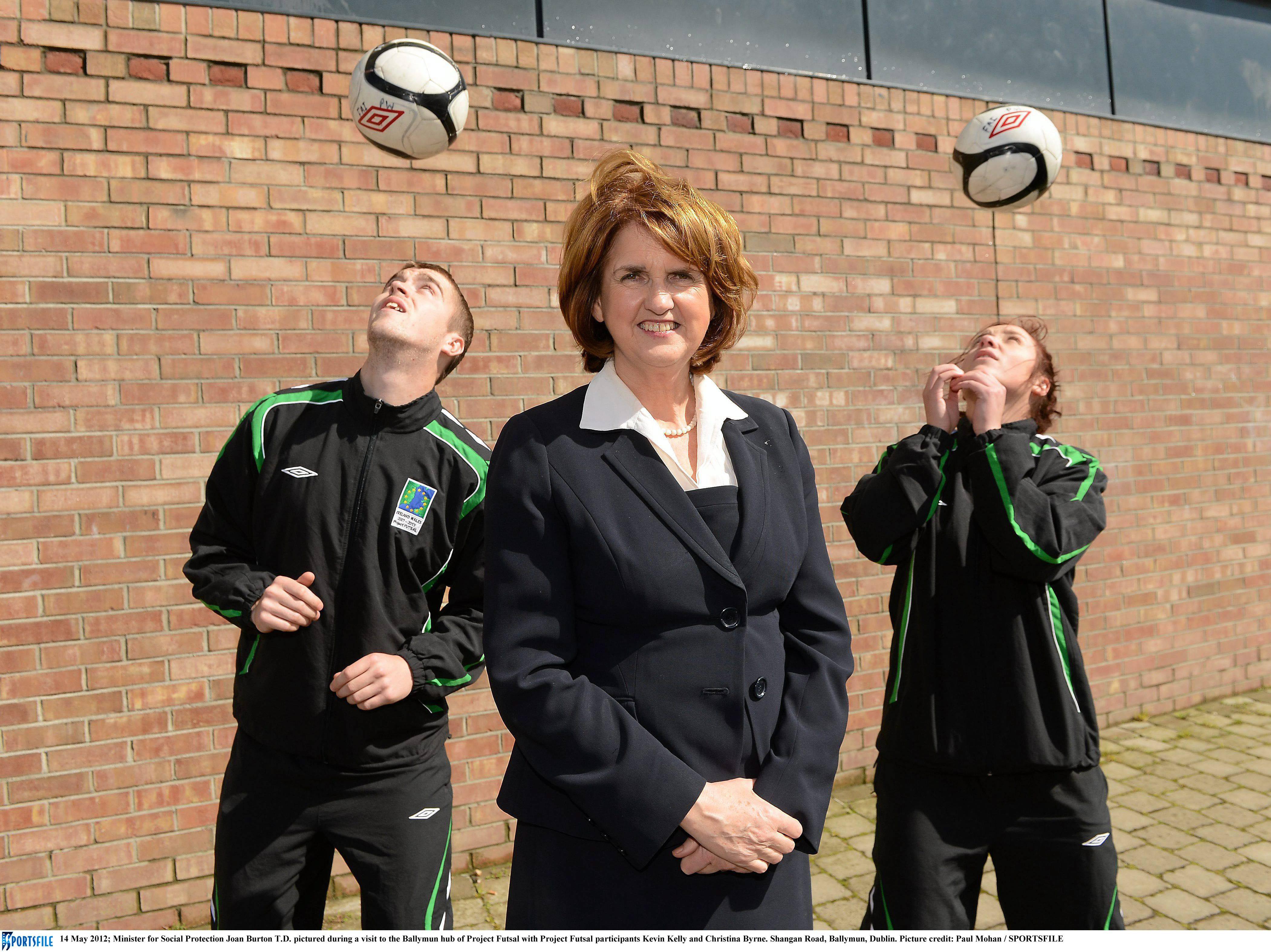 Minister for Social Protection, Joan Burton T.D. pictured during a visit to the Project FUTSAL Ballymun training hub with project FUTSAL participants Kevin Kelly and Christina Byrne. Picture credit: P